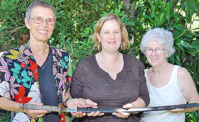 Remembering and Healing Old Wounds founders Sabina Baltruweit, Larisa Barnes and Margaret Loong with the Japanese sword. Remembering and Healing Old Wounds founders Sabina Baltruweit, Larisa Barnes and Margaret Loong with the Japanese sword.