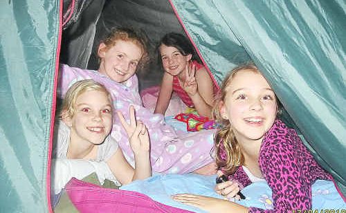 Girl Guides enjoying the Great Aussie Camp Out (from left) Tysharna Wright, Bonnie Howard, Kathleen Schultz and Rae-Louise Wright. Girl Guides enjoying the Great Aussie Camp Out (from left) Tysharna Wright, Bonnie Howard, Kathleen Schultz and Rae-Louise Wright.