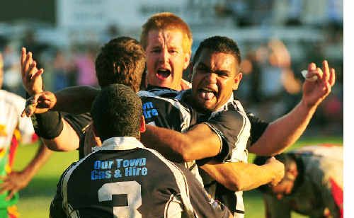 THE 2009 Lower Clarence Magpies celebrate after their grand final win. THE 2009 Lower Clarence Magpies celebrate after their grand final win.