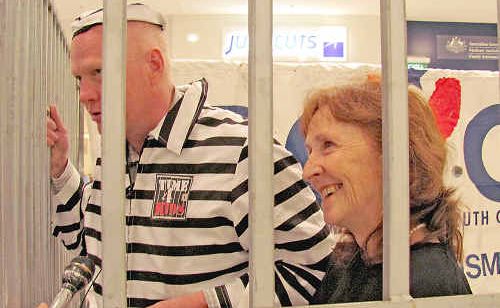 Richmond Local Area Command Superintendent Bruce Lyons and Page MP Janelle Saffin had to get shoppers to bail them out of jail at Lismore Square last Thursday as part of the Time 4 Kids fundraiser. Richmond Local Area Command Superintendent Bruce Lyons and Page MP Janelle Saffin had to get shoppers to bail them out of jail at Lismore Square last Thursday as part of the Time 4 Kids fundraiser.
