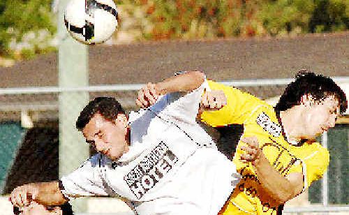 Byron Bay’s Thiago Priori and Goonellabah’s Paul Pomroy fly for the ball in a previous match. Byron Bay’s Thiago Priori and Goonellabah’s Paul Pomroy fly for the ball in a previous match.