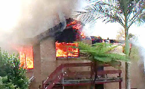 Fire engulfs the house in Frederick Street, Lismore Heights. Fire engulfs the house in Frederick Street, Lismore Heights.