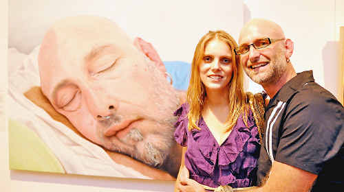 Northern Rivers Portrait Prize winner Cassandra Rijs with her boyfriend Dean Greguric, the subject of her winning portrait You Look So Beautiful When You’re Sleeping. Northern Rivers Portrait Prize winner Cassandra Rijs with her boyfriend Dean Greguric, the subject of her winning portrait You Look So Beautiful When You’re Sleeping.
