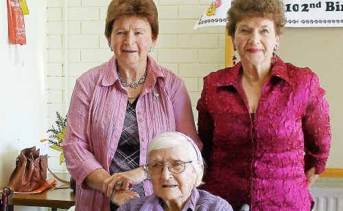 Caroline Nicholls celebrates her 102nd birthday with her daughters Norma Wenham and Eve-Ann Springate. Caroline Nicholls celebrates her 102nd birthday with her daughters Norma Wenham and Eve-Ann Springate.
