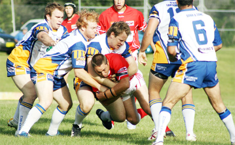 The Red Devils surge for the line against the Murwillumbah Mustangs on Sunday. The Red Devils surge for the line against the Murwillumbah Mustangs on Sunday.
