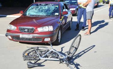 Ouch: A cyclist was taken to hospital after a tangle with a car on the Pacific Highway yesterday. Ouch: A cyclist was taken to hospital after a tangle with a car on the Pacific Highway yesterday.