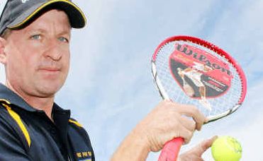 Up for grabs: Brendan Ryan, of Ryanie for Tyres, with a tennis racquet and ball autographed by Roger Federer to be auctioned tonight at the Warwick Cowboys Clubhouse. Up for grabs: Brendan Ryan, of Ryanie for Tyres, with a tennis racquet and ball autographed by Roger Federer to be auctioned tonight at the Warwick Cowboys Clubhouse.