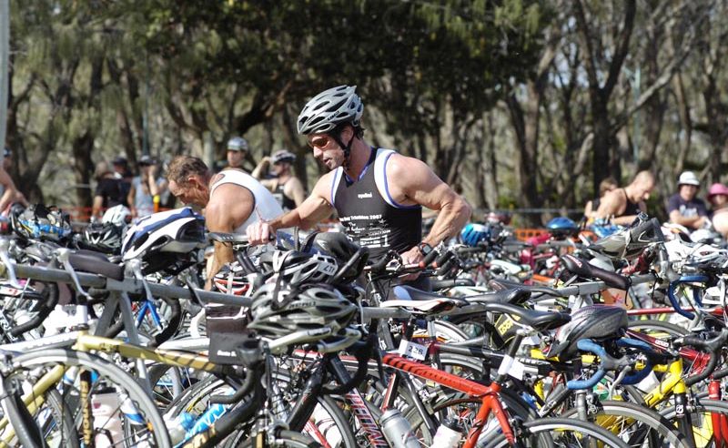 ON YOUR BIKE: A competitor prepares to start the bike leg at a previous Byron Bay Triathlon. ON YOUR BIKE: A competitor prepares to start the bike leg at a previous Byron Bay Triathlon.