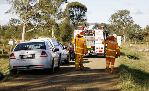 Emergency crews at the site of yesterday’s ultralight crash which claimed the lives of the two male occupants. Emergency crews at the site of yesterday’s ultralight crash which claimed the lives of the two male occupants.