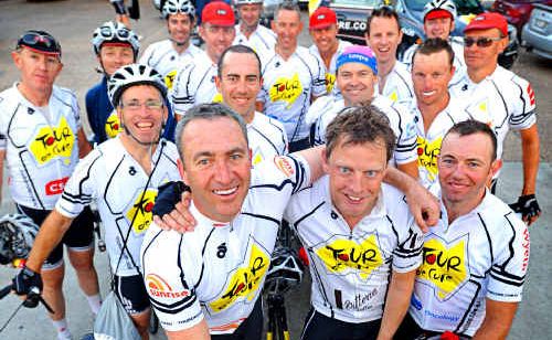 Channel 7 Sunrise sports presenter Mark Beretta, front, joins with his peleton after finishing the Glen Innes-to-Grafton stage of the Tour de Cure. Channel 7 Sunrise sports presenter Mark Beretta, front, joins with his peleton after finishing the Glen Innes-to-Grafton stage of the Tour de Cure.