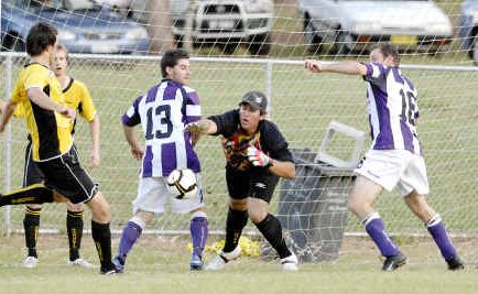 Goonellabah goalkeeper Brad Robertson battles to prevent Pottsville scoring in the game at Weston Park, Goonellabah, last Saturday. The home team won 3-2. Goonellabah goalkeeper Brad Robertson battles to prevent Pottsville scoring in the game at Weston Park, Goonellabah, last Saturday. The home team won 3-2.