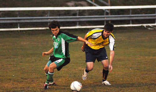 Maclean Bobcats’ Brad Usher (left) haggles with Orara Valley at the Maclean Showgrounds. Maclean Bobcats’ Brad Usher (left) haggles with Orara Valley at the Maclean Showgrounds.