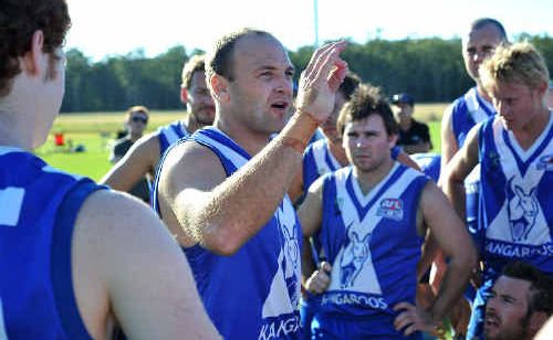 Laying down the law: North Coffs coach Darren Funston addresses his team at quarter time. Laying down the law: North Coffs coach Darren Funston addresses his team at quarter time.