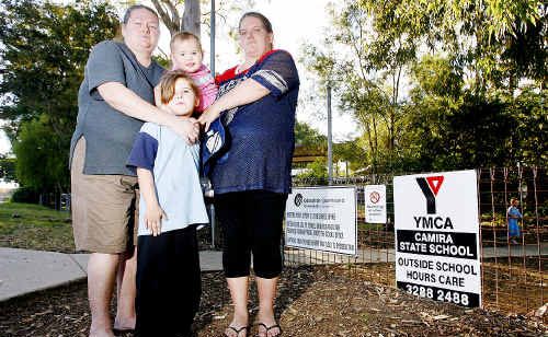 Amanda Glennie (left) and Carlie Brown (right) with Carlie’s children, Mackenzie, 6 and Beeanka, 17 months, outside the Camira State School. Amanda Glennie (left) and Carlie Brown (right) with Carlie’s children, Mackenzie, 6 and Beeanka, 17 months, outside the Camira State School.