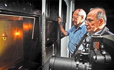 Spiro and Angelo Notaras look out into one of two 160-seat cinemas at the Saraton Theatre complex. Spiro and Angelo Notaras look out into one of two 160-seat cinemas at the Saraton Theatre complex.