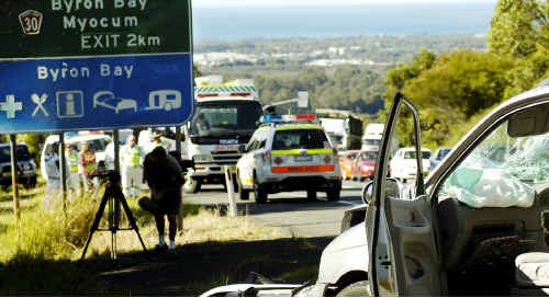 The scene on the Pacific Highway near Bangalow after an accident that claimed the life of a Queensland woman. The scene on the Pacific Highway near Bangalow after an accident that claimed the life of a Queensland woman.