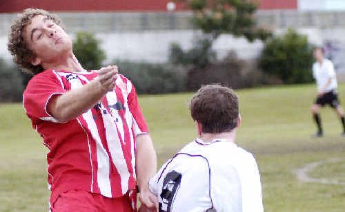 Workers’ Luke Pirlo (left) heads the ball during their 2-all draw with Alstonville in Lismore yesterday. Workers’ Luke Pirlo (left) heads the ball during their 2-all draw with Alstonville in Lismore yesterday.