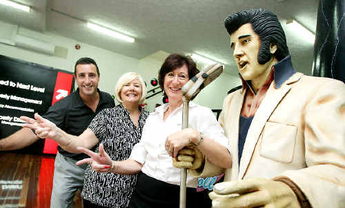 DJ Stringer owner and principal David Stringer with employees Sue McMaster and Wendy Herridge and the real estate agency’s Elvis statue ahead of the beginning of Wintersun. DJ Stringer owner and principal David Stringer with employees Sue McMaster and Wendy Herridge and the real estate agency’s Elvis statue ahead of the beginning of Wintersun.