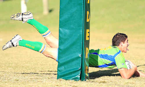 Raiders hooker Cale Rowston crosses in style during yesterday’s rugby league win over the Magpies. Raiders hooker Cale Rowston crosses in style during yesterday’s rugby league win over the Magpies.