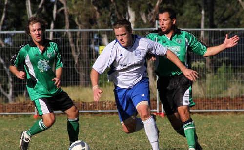 Soccer star: Northern Storm’s Sam Sawtell gets away from two Maclean players. Soccer star: Northern Storm’s Sam Sawtell gets away from two Maclean players.