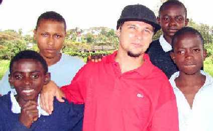 Sad farewell: Kyogle man Tim Hoffman says goodbye to students at the Kabete Rehabilitation School outside Nairobi before returning to Australia. Sad farewell: Kyogle man Tim Hoffman says goodbye to students at the Kabete Rehabilitation School outside Nairobi before returning to Australia.