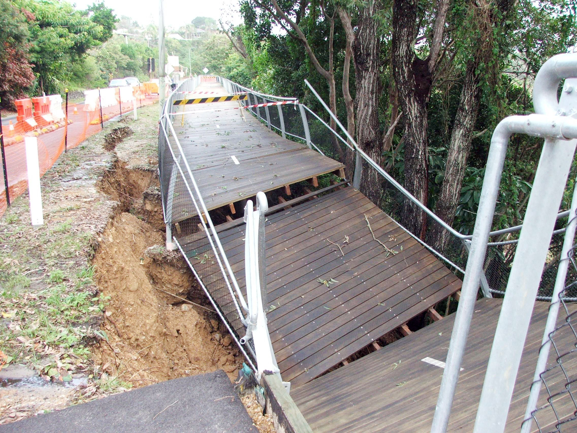 The scene five years ago. The collapsed section of the Lighthouse Road walkway. The scene five years ago. The collapsed section of the Lighthouse Road walkway.