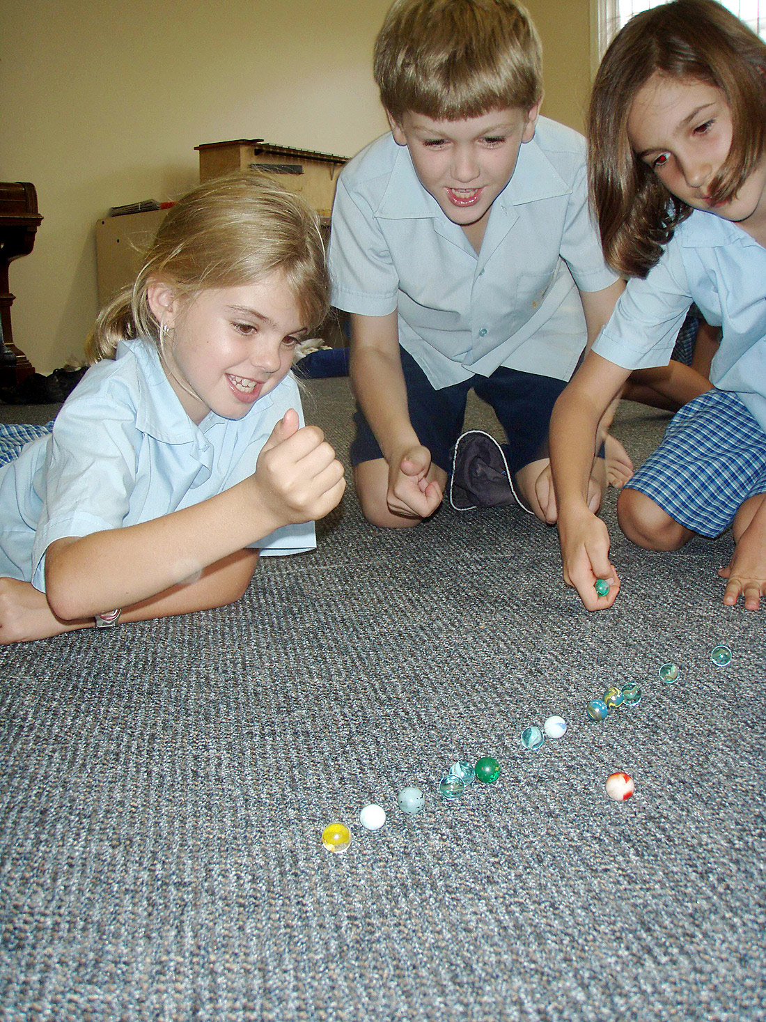 Pupils from St John’s Catholic School at Mullumbimby get in some practice for the schools marbles challenge. Pupils from St John’s Catholic School at Mullumbimby get in some practice for the schools marbles challenge.