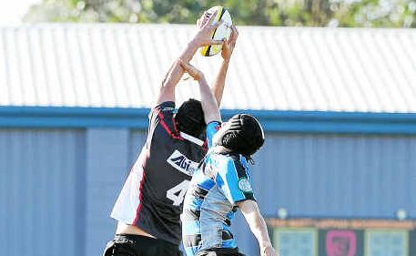 Flying high: Mid North Coast and Far North Coast locks contest lineout possession. Flying high: Mid North Coast and Far North Coast locks contest lineout possession.