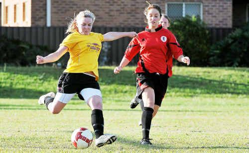 Corindi-Red Rock’s Laura Hall takes on the Coffs United defence at Maclean Street. Corindi-Red Rock’s Laura Hall takes on the Coffs United defence at Maclean Street.