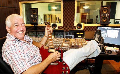 Old rocker Allan Pease plays a tune in his studio. Old rocker Allan Pease plays a tune in his studio.