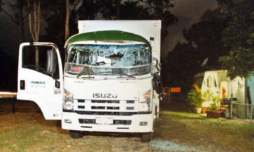 Andrew Gretton's truck was damaged with an excavator after a dispute about an unpaid bill. Andrew Gretton's truck was damaged with an excavator after a dispute about an unpaid bill.
