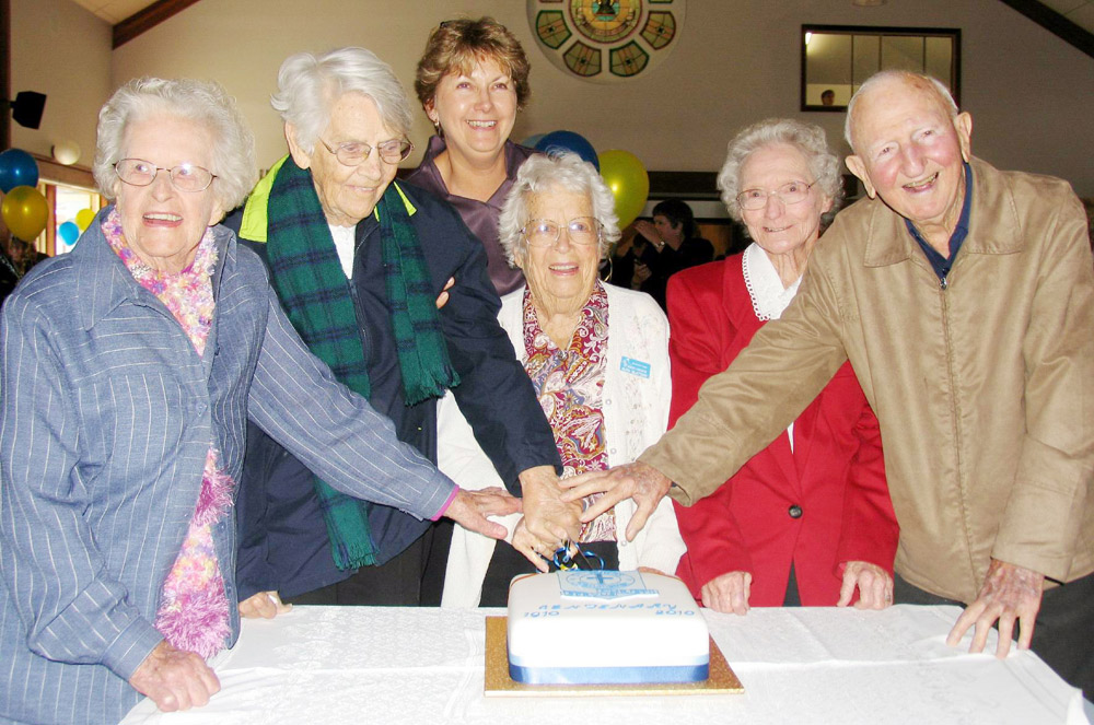 Cutting the 100th birthday cake were the school’s oldest surviving students (from left to right) Marge Buckley, Mary Walker, Ruth Slattery, Norah Porthouse and Bill Shay, with Mary Walker’s daughter Francis in the background. Mary now has a great grandson at the school. Cutting the 100th birthday cake were the school’s oldest surviving students (from left to right) Marge Buckley, Mary Walker, Ruth Slattery, Norah Porthouse and Bill Shay, with Mary Walker’s daughter Francis in the background. Mary now has a great grandson at the school.