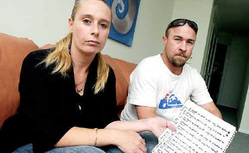 Mum Lisa Limond with partner Tony Morgan, holds a letter by her son Reece expressing his frustration at being constantly bullied at school. Mum Lisa Limond with partner Tony Morgan, holds a letter by her son Reece expressing his frustration at being constantly bullied at school.