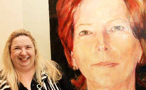 Susi Muddiman with the Julia Gillard portrait at the Tweed Regional Art Gallery. Susi Muddiman with the Julia Gillard portrait at the Tweed Regional Art Gallery.