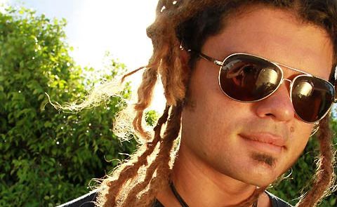 Ash Grunwald’s fifth studio album, Hot Mama Vibes, is neck-deep in the technological swamp of the 21st Century. It’s also the most primal concoction of elemental junkyard soul to stomp through your speakers this year. Ash Grunwald’s fifth studio album, Hot Mama Vibes, is neck-deep in the technological swamp of the 21st Century. It’s also the most primal concoction of elemental junkyard soul to stomp through your speakers this year.