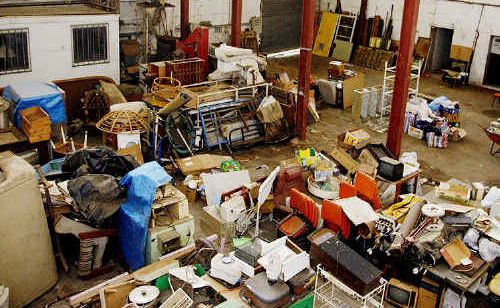 The Grantham Butter Factory is on the market, but is filled with junk accumulated by a resident squatter. Former factory worker Lou Kleidon (below) is saddened by the state of the old building. The Grantham Butter Factory is on the market, but is filled with junk accumulated by a resident squatter. Former factory worker Lou Kleidon (below) is saddened by the state of the old building.