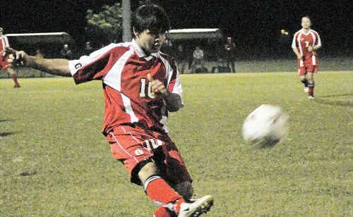 Yaralla’s Daniel Barletta drives the ball in the game against BITS on Saturday night. Yaralla’s Daniel Barletta drives the ball in the game against BITS on Saturday night.
