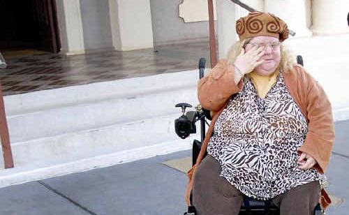 Paraplegic Maz Smyth spent this week trying to get council to help her only to be told she was too fat for her wheelchair. Paraplegic Maz Smyth spent this week trying to get council to help her only to be told she was too fat for her wheelchair.