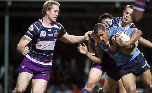 Guy Williams and Chris Beasley stop another Norths attack. Guy Williams and Chris Beasley stop another Norths attack.