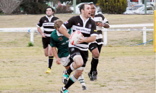 Warwick centre Bob Nicholls on the attack against Condamine. Warwick centre Bob Nicholls on the attack against Condamine.