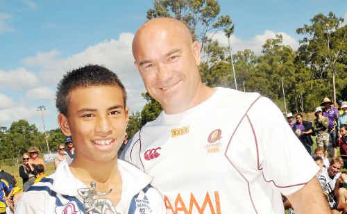 Jason Hetherington with cup winner St Brendan’s captain Cambell Pirihi on Sunday. Jason Hetherington with cup winner St Brendan’s captain Cambell Pirihi on Sunday.
