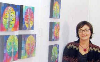 Colour capers: Artist Loretta Grayson with some of her artworks. Colour capers: Artist Loretta Grayson with some of her artworks.