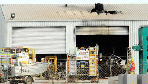 Emergency services rushed to this Paget shed yesterday after an explosion killed a 31-year-old Mackay man. Emergency services rushed to this Paget shed yesterday after an explosion killed a 31-year-old Mackay man.