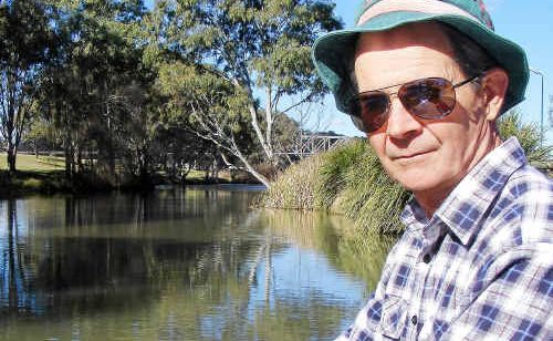 Hooked on making a difference: Warwick and District Fish Stocking Association treasurer/secretary Ed Kemp battles the mongrel carp in the Condamine River. Hooked on making a difference: Warwick and District Fish Stocking Association treasurer/secretary Ed Kemp battles the mongrel carp in the Condamine River.