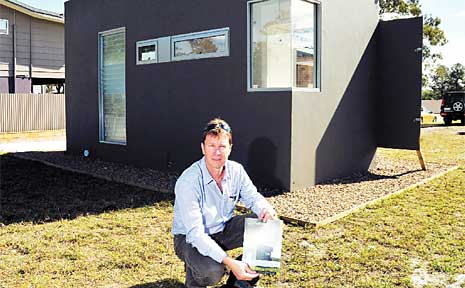 Buildfirst managing Director Gary Elks with one of the pods already garnering interest. Buildfirst managing Director Gary Elks with one of the pods already garnering interest.