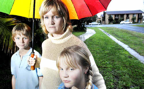Anthony Buckingham, 11, and Tamsin Buckingham, 10, with mum Richelle Buckingham of Ballina, who has been taken to court and fined by the Ballina Shire Council for having a trampoline set up on the footpath. Anthony Buckingham, 11, and Tamsin Buckingham, 10, with mum Richelle Buckingham of Ballina, who has been taken to court and fined by the Ballina Shire Council for having a trampoline set up on the footpath.