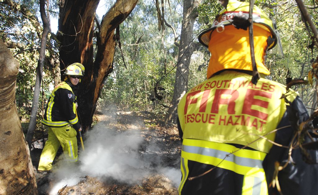 Firefighters from the NSW Goonellabah Fire Brigade extinguish a small scrub fire on the Bruxner Highway near Goonellabah. Firefighters from the NSW Goonellabah Fire Brigade extinguish a small scrub fire on the Bruxner Highway near Goonellabah.