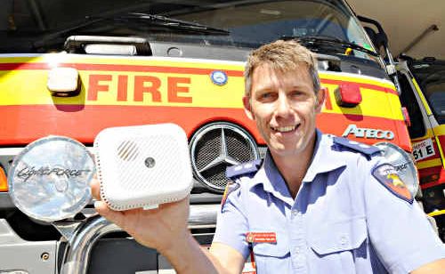 Station Officer Matthew Phillips says QFRS strongly recommends the photoelectric smoke alarms. Station Officer Matthew Phillips says QFRS strongly recommends the photoelectric smoke alarms.