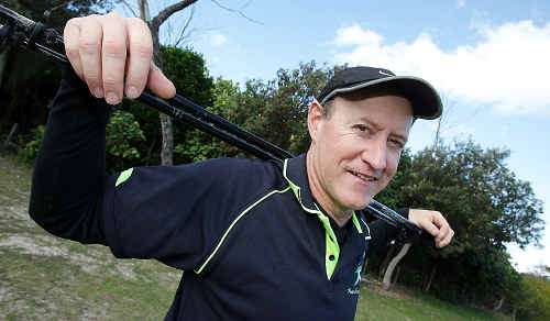 Waling wonder: Pole walker Mike Gates has set a new world record in aid of Kids in Need. Waling wonder: Pole walker Mike Gates has set a new world record in aid of Kids in Need.