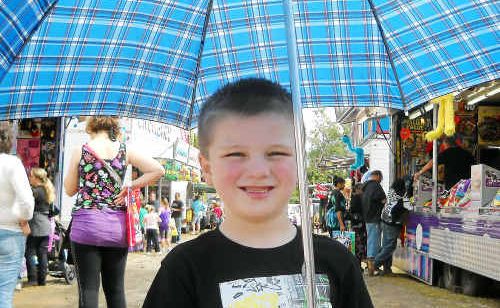 The rain didn’t stop Cobey Norberton, 5, from going to the Gladstone show. The rain didn’t stop Cobey Norberton, 5, from going to the Gladstone show.